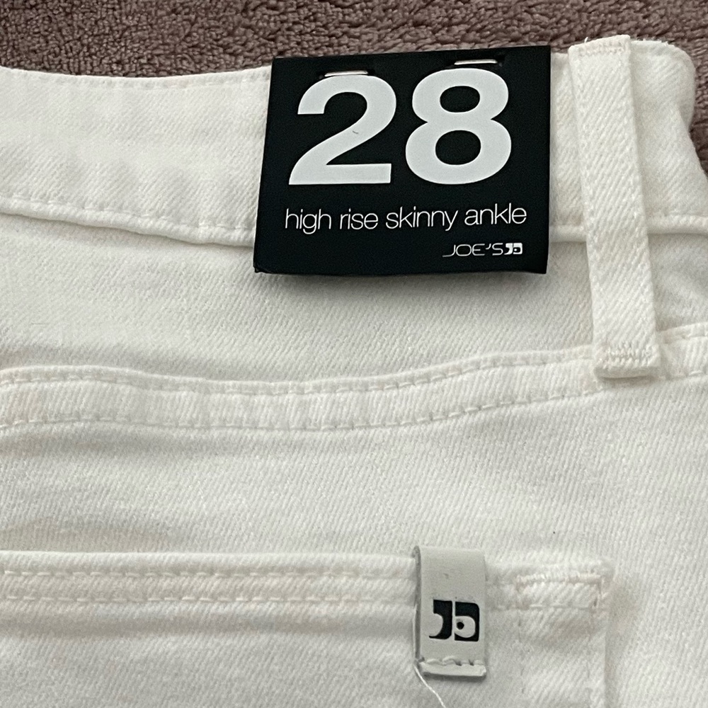 Joe’s white skinny jeans.  Never been worn.  Tags still attached.